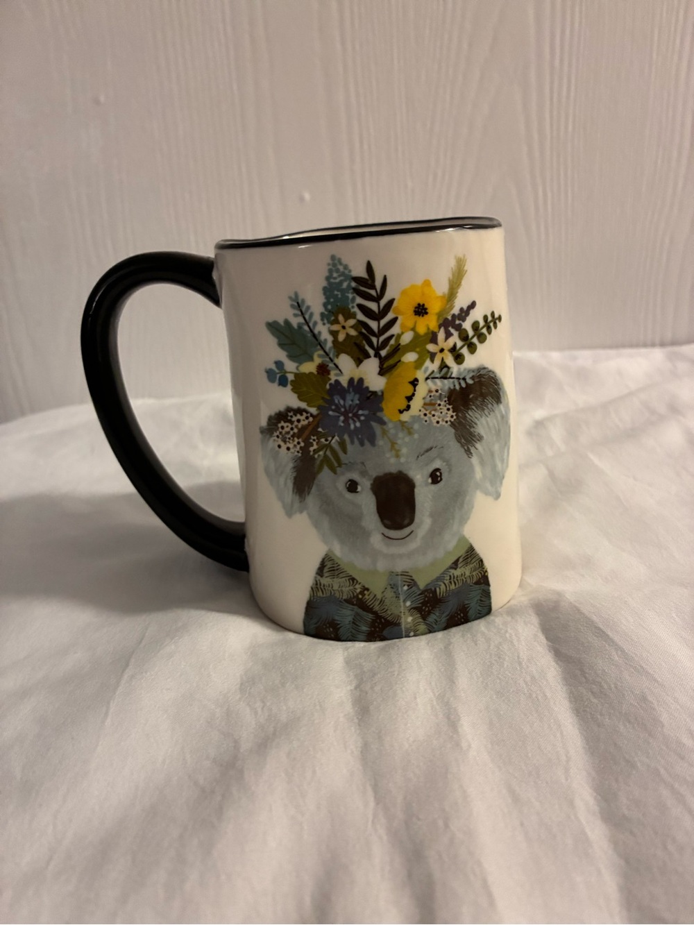 Signature White Mug with Black Handle and Floral Koala Design